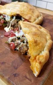 Bj S Small Deep Dish Pizza This Meat Lovers Gameday Calzone Has All The Fixings Of A Cheesy Supreme Pizza In A Football Calzone Form Fun To Make And Even Mor Recipes Food Calzone Recipe