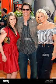 Jim Carrey with daughter Jane Erin and Jenny McCarthy Horton Hears A Who !  Premiere at the Westwood Theatre In Los Angeles. three quarters eye contact  smile CarreyJim McCarhyJenny JaneErin 035 Event