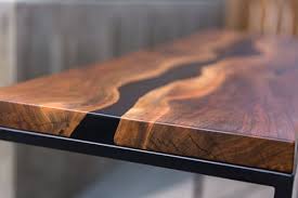 This faux live edge desk is a smoothed over live edge on all sides with stylish, rustic, iron legs. Live Edge Desk Wescover