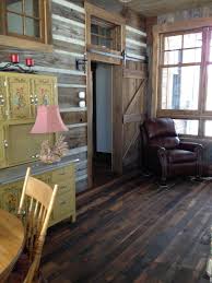 I created a mixed wood wall with cheap wood paneling from lowes, stain and paneling nails for around $40. Ideas For Using Barn Wood And Antique Wood In Interior Design Ron Holstrom Antique Floors