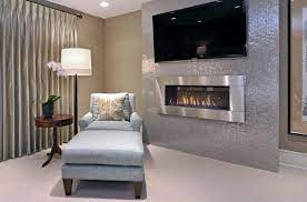 Wallpapering just the chimney breast is a classic approach. Custom Built Fireplace Ideas For A Living Room