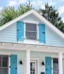 Check out our blue wood shutters selection for the very best in unique or custom, handmade pieces from our shops. Decorative Coastal Window Shutters For Curb Appeal Coastal Decor Ideas Interior Design Diy Shopping