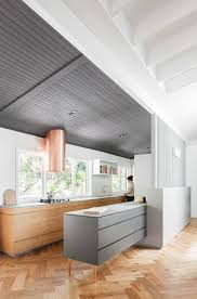 Mid Century Modern Kitchen And Living Room Design Vaulted Ceiling And Light Maple Floors Modern Kitchen Design Simple Kitchen Remodel Kitchen Remodel Trends