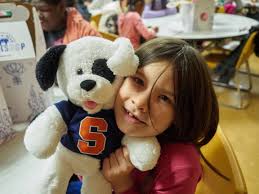 Church kids build toy bears and make tykes' day