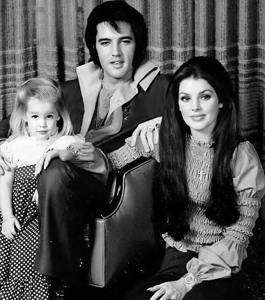 Elvis Presley with his family