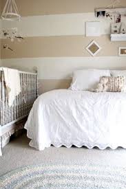 10 Nursery Essentials What You Really Need Baby Room Neutral Striped Walls Room