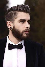 Hipster Haircuts Men Undercut Style With Big Ear Piercings Hipster Hairstyles Hipster Haircuts For Men Hipster Haircut