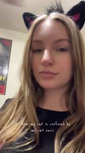 My cats reaction to my halloween cat ears🤣 #halloweencostume #halloween24  #cat #blackcat #spookyseason #fyp #fypシ #catmom