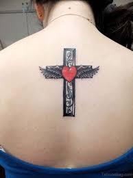 Black ink anchor in heart tattoo on left hand. 97 Stunning Cross Tattoos For Back