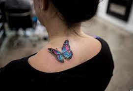 Blue Amp Pink Butterfly Tattoo Done By Rob Green Butterfly Tattoo On Shoulder Realistic Butterfly Tattoo Butterfly Tattoo