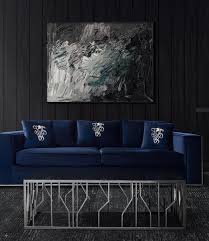 Velvety soft aged leather mingles with draped linen and a shimmering silver rug, tempering the sharp geometry of the cabinetry and tom dixon side tables. Casa Padrino Luxury Coffee Table Silver Black 125 X 65 X H 43 Cm Rectangular Stainless Steel Living Room Table With Glass Top Living Room Furniture Luxury Quality