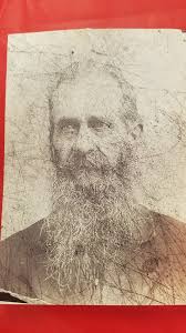 Any ideas to identify people in this 1900s photo?