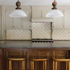 Subway tile is a classic choice for a kitchen backsplash. Cream Arabesque Tiled Backsplash Design Ideas