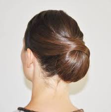 A bun is a type of hairstyle in which the hair is pulled back from the face, twisted or plaited, and wrapped in a circular coil around itself, typically on top or back of the head or just above the neck. 50 Different Types Of Bun Hairstyles For Any Occasion