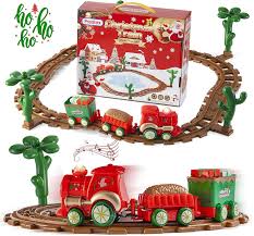Glass vintage santa ornaments sparked this tree wrapped in red. 6 Best Christmas Tree Train Sets For Holiday Fun