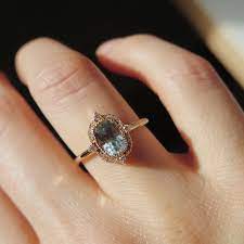 A Custom Engagement Ring With A 1 53 Carat Untreated Montana Sapphire Plus Tiny Diamond Accents