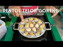 Pentol goreng di malino pentol goreng yang berbahan dasar telur ,tahu yang di goreng bulat di gemari oleh semua kalangan. Murah Bikin Nagih Pentol Dibalut Telor Goreng Jajanan Pinggir Jalan Pontianak Street Food By Berburu Kuliner