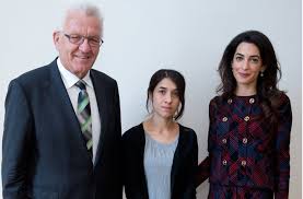 Amal clooney decries 'legal charade' after journalist maria ressa charged again with libel. Gegen Menschenhandel Amal Clooney Und Ex Is Gefangene Treffen Kretschmann Baden Wurttemberg Stuttgarter Zeitung