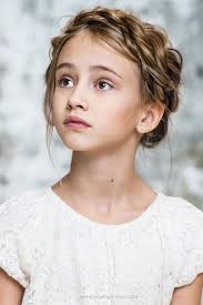 Part your little girl's hair down the middle. Picture Of Edgy Braided Hairstyles For Little Girls 5