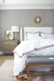 This beautiful accent wall in the master bedroom features various shades of wood making it a totally unique look that's both chic and rustic. A Thoughtful Place Mater Bedroom Layers Of Bedding Home Bedroom Wallpaper Bedroom Mater Bedroom