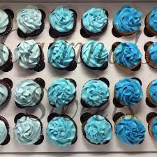 Simple Classy Baby Shower Cupcake Order 3 Tones Of Blue For A Much Awaited Baby Baby Shower Cupcakes For Boy Baby Shower Cakes For Boys Baby Shower Cupcakes