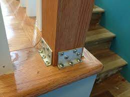 How To Hide Stair Post Brackets With Wood Molding Stair Railing Makeover Wooden Stairs Diy Stairs