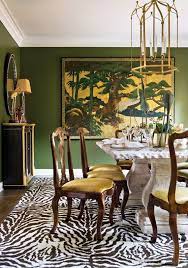 A muted green is at the top of my list in cabinet colors for an upcoming remodeling the inside of my dining room hutch is a shade of olive green , i've always loved it! Simplified Bee Home Organization Design Solutions Green Interior Design Green Dining Room Asian Home Decor