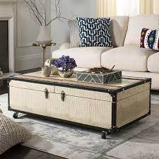 Storage coffee tables for a tidy living room. Safavieh Faux Crocodile Wine Rack Storage Trunk Coffee Table