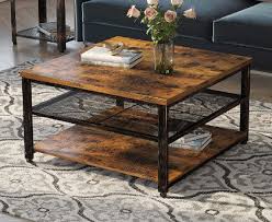 This coffee table creates a distinctive and modern atmosphere and it is convenient to place in front of your sofa or any seating area. China Industrial Coffee Table With Storage Shelves 3 Tier Square Cocktail Table For Living Room On Global Sources Dining Table Coffee Table End Table