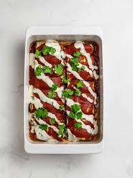 Continue filling the enchiladas, lining them up in the dish side by side; Vegan Chicken Zucchini Enchiladas Low Carb Foodaciously