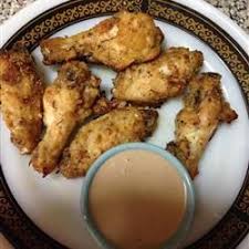 That's right, they were baked in the oven. Garlic And Parmesan Chicken Wings The Trick To Keeping These Oven Baked Chicken Wings Crispy Is Parboil Chicken Wing Recipes Recipes Parmesan Chicken Wings
