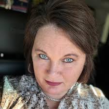 can someone restore this photo of my late wife with our grand daughter  please in a nice back ground if possible thank you