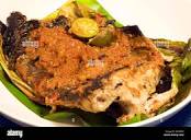 Ikan Bakar" (grilled sting ray) Malaysian dish Stock Photo - Alamy