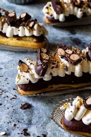Chocolate Eclairs With Creme Caramel Eclair Recipe Chocolate Eclair Recipe Desserts