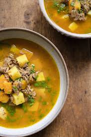 Haitian Style Pumpkin And Beef Soup Soup Joumou Recipe Haitian Food Recipes Beef Soup Soup Joumou