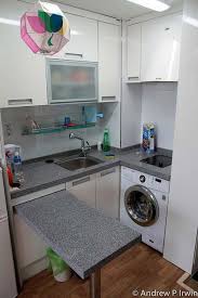 19 Beautiful Showcases Of U Shaped Kitchen Designs For Small Homes Homesthetics Inspiring Ideas For Yo Tiny Kitchen Small Spaces Laundry Room Folding Table