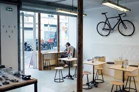 Westberlin in berlin, germany, is a coffee bar and media shop, and all the books and magazines are front and center along the walls. Cafe Interior Designs Cafe Small Coffee Shop Design Concepts