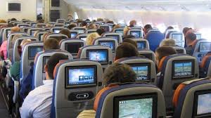 اقتصاد ن ماذا فئات الخدمة على الطائرات وفئات تذاكر الطيران Y أغلى خيار في الدرجة الاقتصادية
