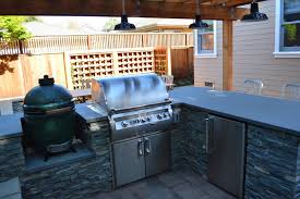 big green egg in custom outdoor kitchen