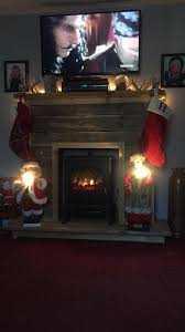 How to choose an electric fireplace? Not Really Repurposed But Fabulous Idea A Little Electric Heater With A Fireplace Mantle Built Around It Faux Fireplace Diy Faux Fireplace Fireplace Heater