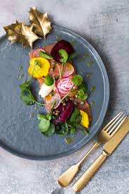 Hot and cold smoked salmon are very different. Smoked Salmon Carpaccio With Horseradish Cream Rainbow Beetroot Radish Capers And Watercress Claire Justine