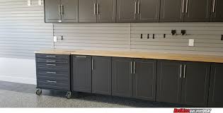 Modular cabinets garage cabinets base cabinets garage doors man cave garage butcher block countertops shop organization garage shop garage red moduline aluminum garage cabinets in this beautiful custom garage. Garage Bike Storage Solution For A Dedicated Cyclist In Central Florida