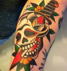 Shop tattoo inks, tattoo pens, and accessories. Colorful Traditional Skull With Sword And Flowers Tattoo On Body