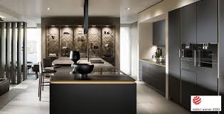 Dressed with undulating negra cantera stone, the massing elements of outside in bring an artistic stature to the project's design hierarchy. Design Kuchen Markenhersteller Wien Und Edle Kuchenbauer