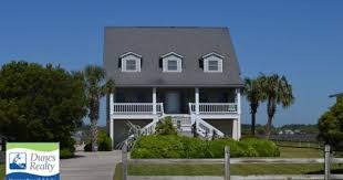 Henry S Orchard Garden City Beach Second Row South On Canal Beach Home Vacation Rental From Dunes Realty Garden City Beach Garden City Beach Rentals