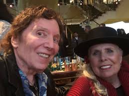 Joni with Louis Kemp, producer of Bob Dylan's Rolling Thunder revue and Dylan's  friend since childhood.