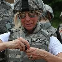 U.S. Army Sgt. Courtney Mckelvey teaches Spc. Sean