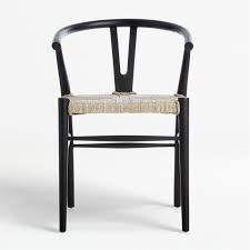 Crescent Black Rush Seat Dining Chair Reviews Crate And Barrel In 2020 Dining Chairs Rattan Dining Chairs Black Dining Chairs