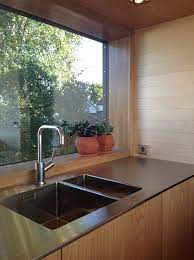 Before you take out the tape measure, make a sketch representing countertop placement in your kitchen. Scandinavian Retreat A Few More Snaps From Our Kitchen Stainless Kitchen Replacing Kitchen Countertops Kitchen Design