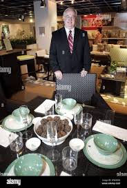 Bill Markowitz stands by some of the outdoor furniture